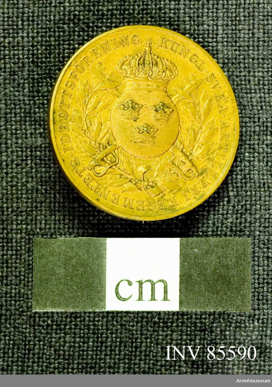 Grupp M.
Medaljen lika med n:16279 med den skillnad, att materialet är ljus brons. 
