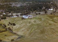 Flyfoto av Fugleberg, Vadsø kommune, 1963.