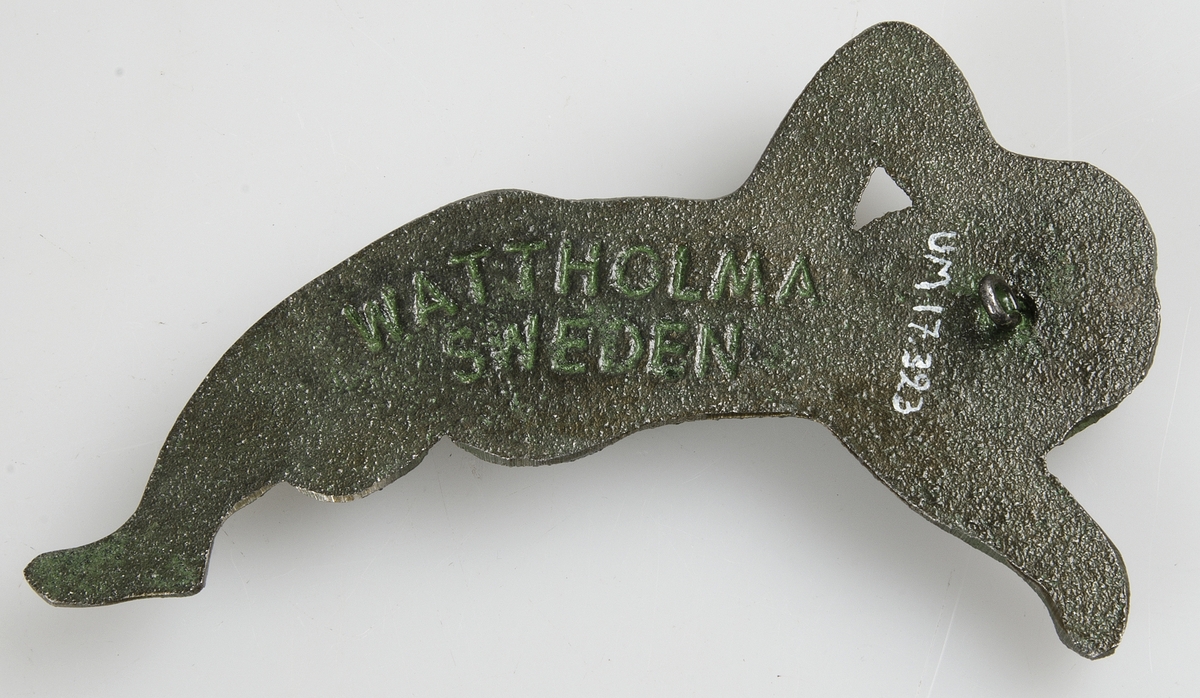 Figur, en s.k. Wattholmaängel av grönpatinerat gjutjärn. Stämplad på baksidan "WATTHOLMA SWEDEN". Upphängningsögla.


