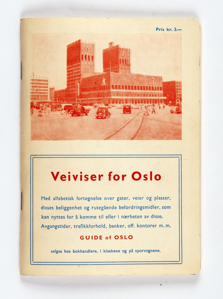 Lite stiftet hefte av tynn papp, illustrert med foto av Oslo Rådhus.
Tekst og motiv: rødbrun, blå