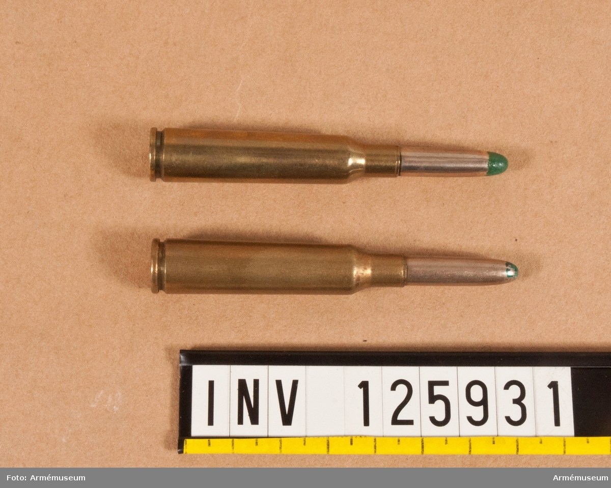 6,5 mm skarp patron m/1894, endast för fredsskjutning?
Grön spets betyder ej avsedd för automatvapen, jämför AM.139635. 2019-11-01 EW