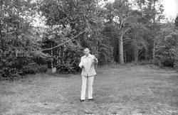 Landskap med person(er).