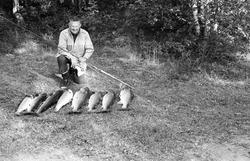 Fangst med person(er).