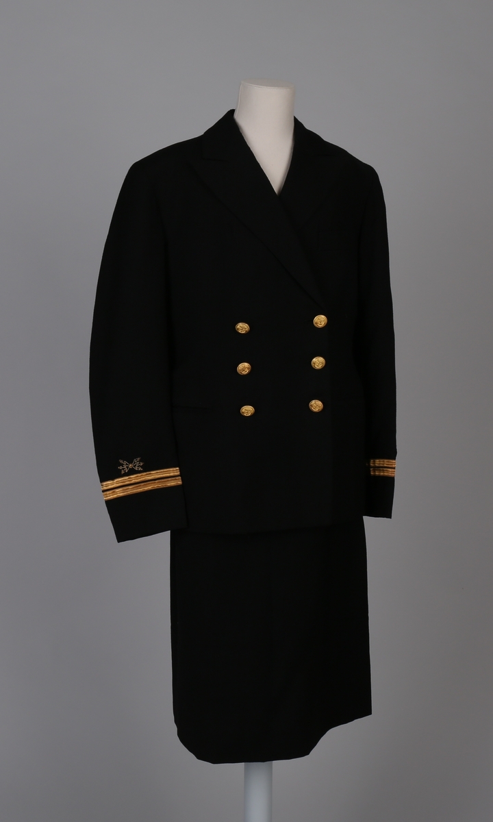Telegrafist-uniform bestående av jakke, skjørt, bukse og uniformslue for kvinne.