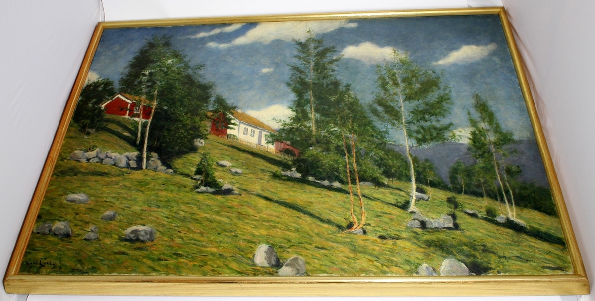 Måleri av Karl Løkke (1870-1943) med tittelen "Ivar Åsens fødested i Voldens præstegjeld i Sundmøre". Kunstverket vart truleg kjøpt frå Blomqvist kunsthandel i 1979. Måleriet har ramme.