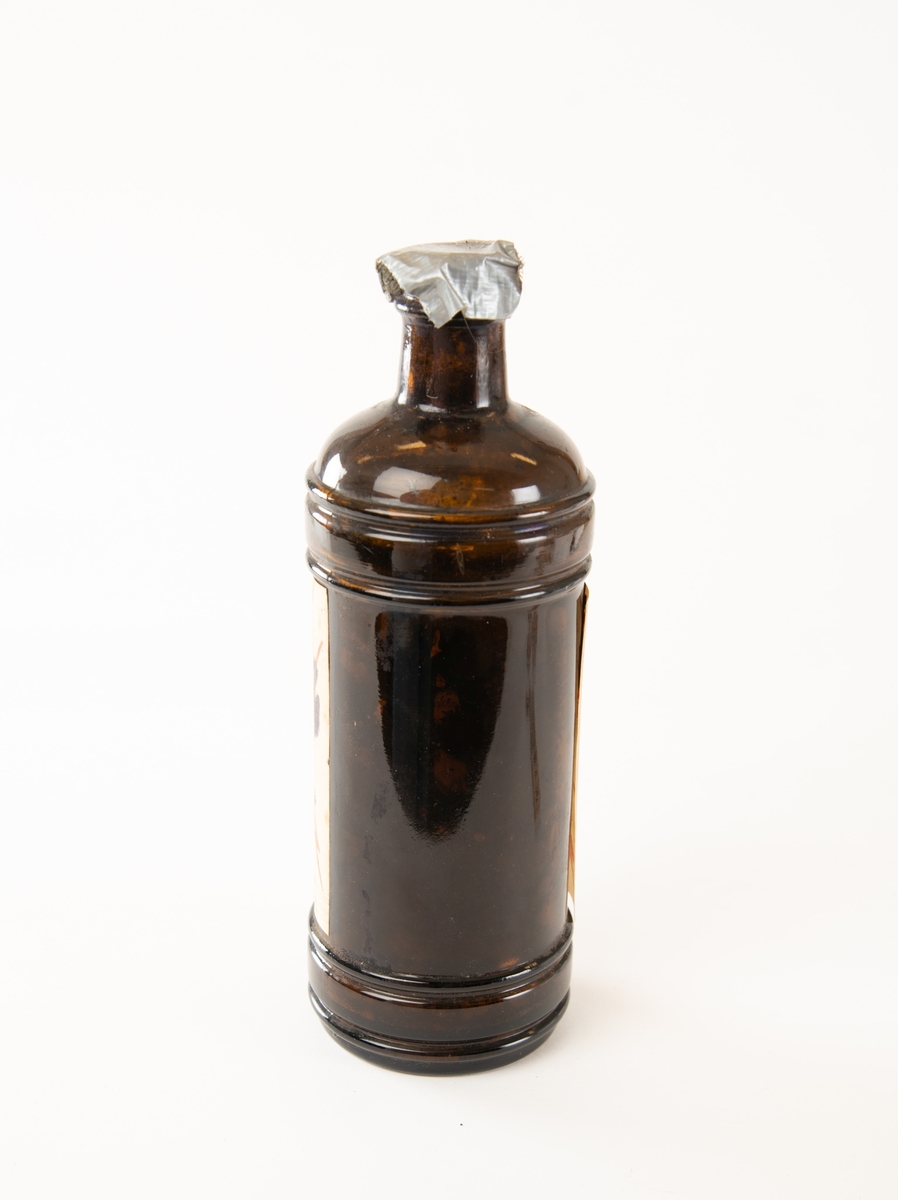 Syliderformet flaske, opprinnelig med skrukork.