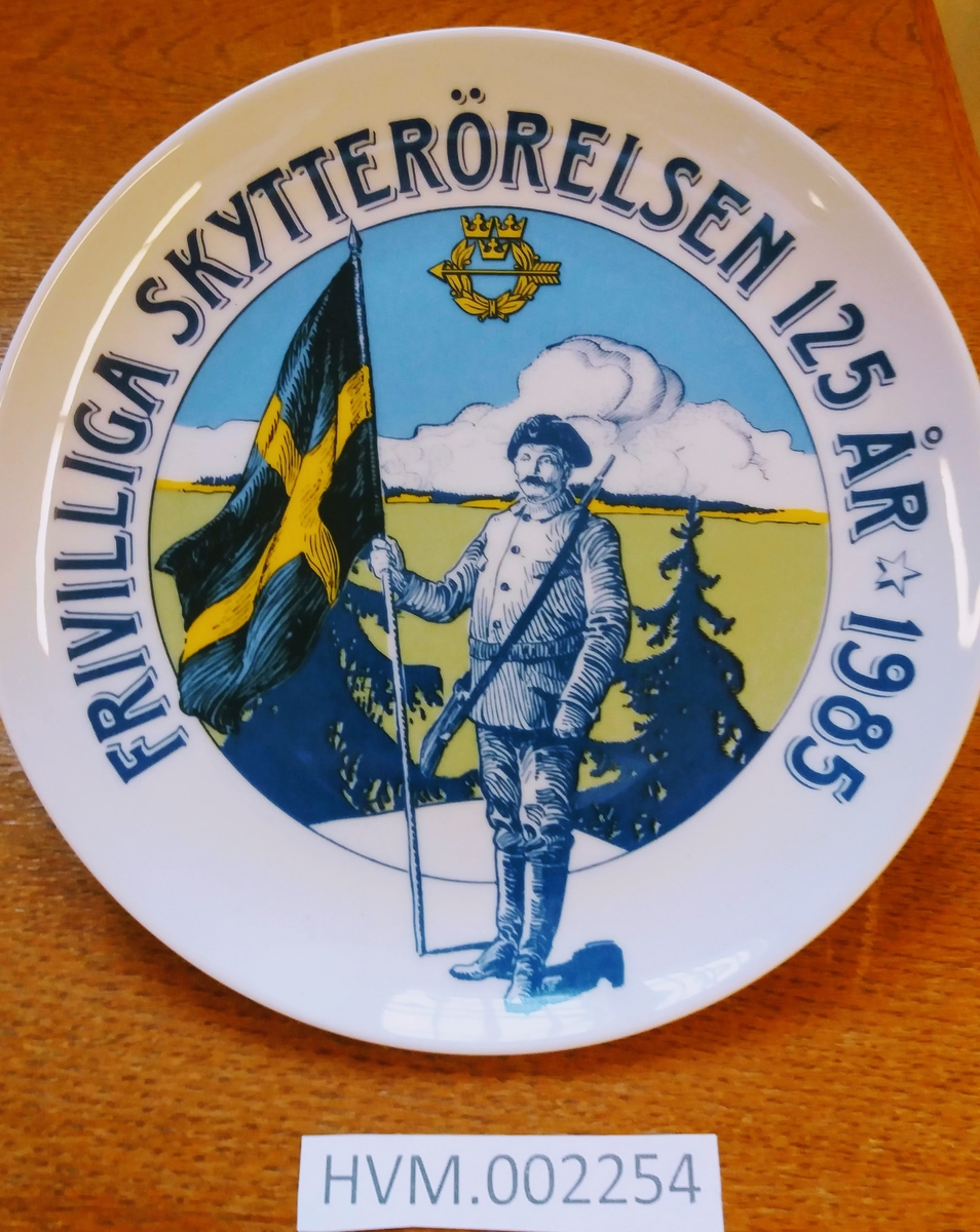 Tallrik porslin, Friv. Skytterörelsen 125 år, 1985