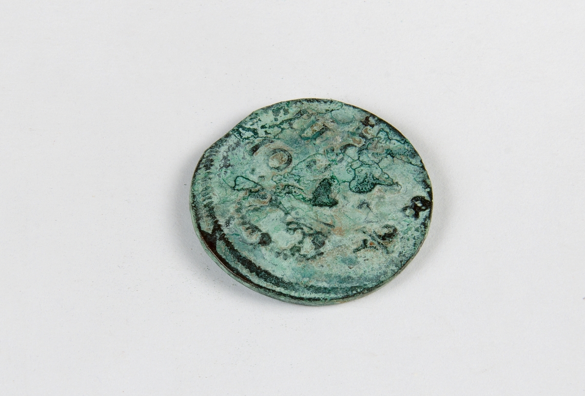 Mynt av kopparlegering. 1/6 öre SM, med årtal 1666.