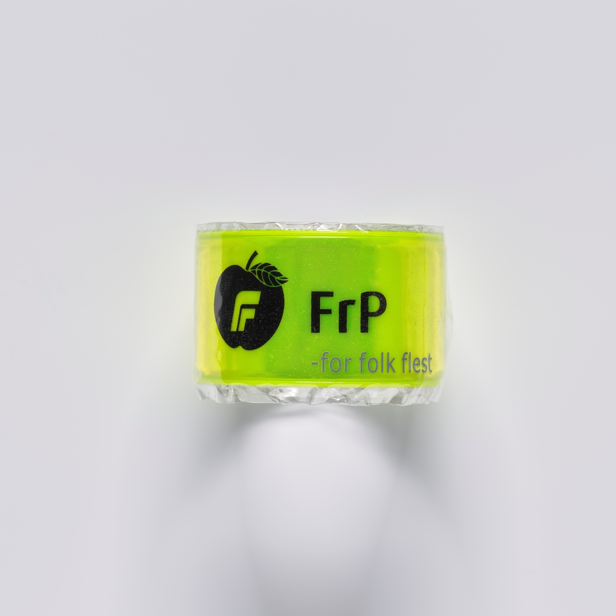 Et eple med Fp som er logoen for Fremskrittspartiet.