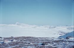 Utsikt over fjellandskap mot Gryteflot på vintertid