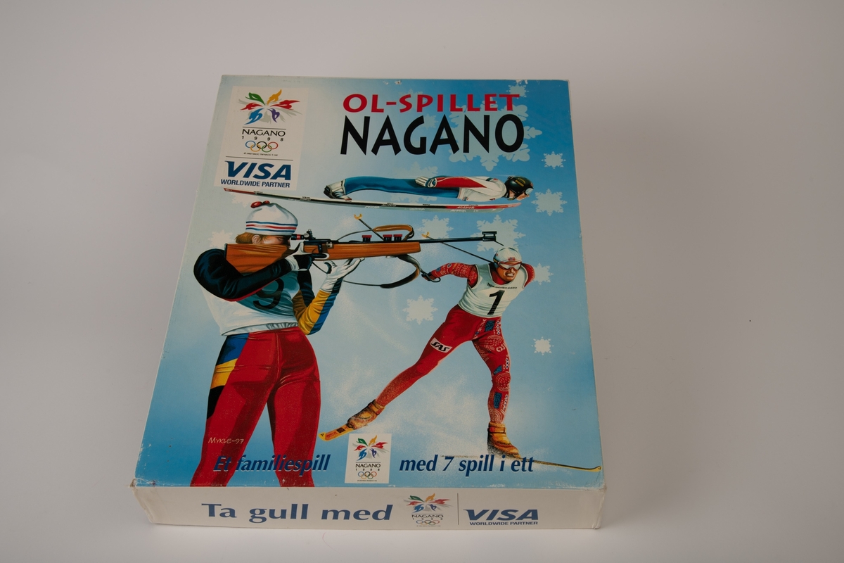 Illustrasjon på lokket: En skihopper, en langrennsløper og en skiskyter i front.