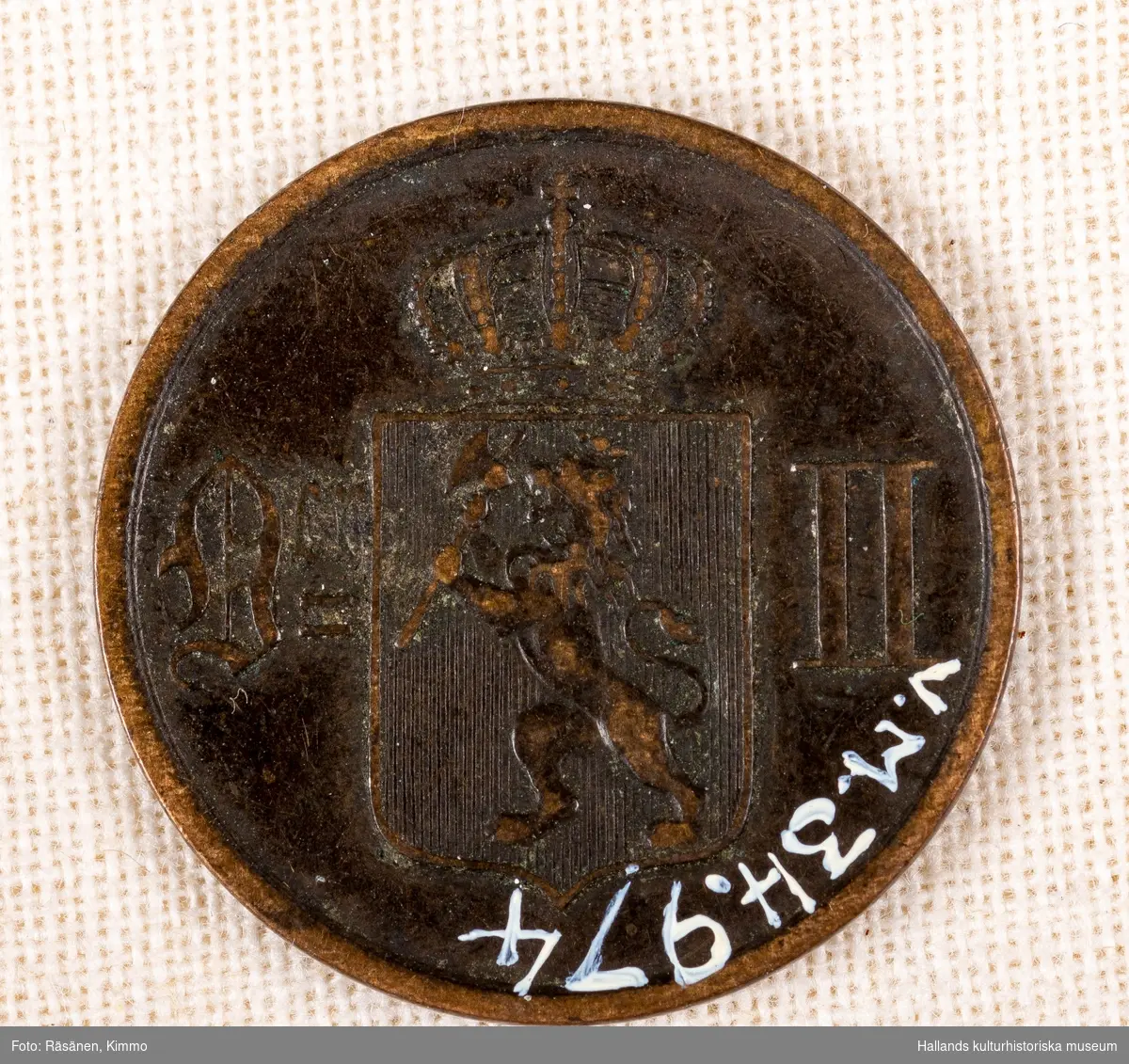 Mynt av koppar. 2 ØRE (öre).1897Oscar IIs namnchiffer (teckning)