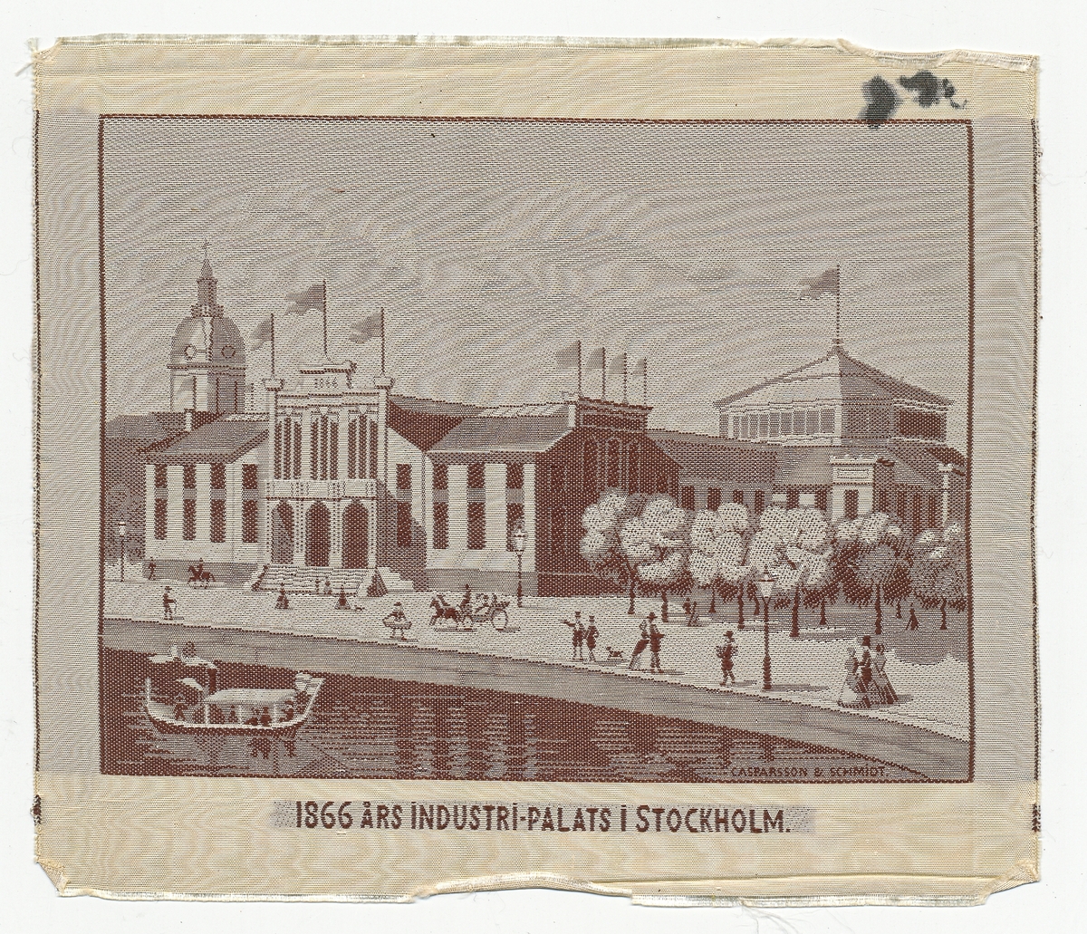 Prov på vävning i papperskuvert. Utsikg 1866 års industripalats Stockholm. Vävd i siden vid Casparsson & Schmidt.