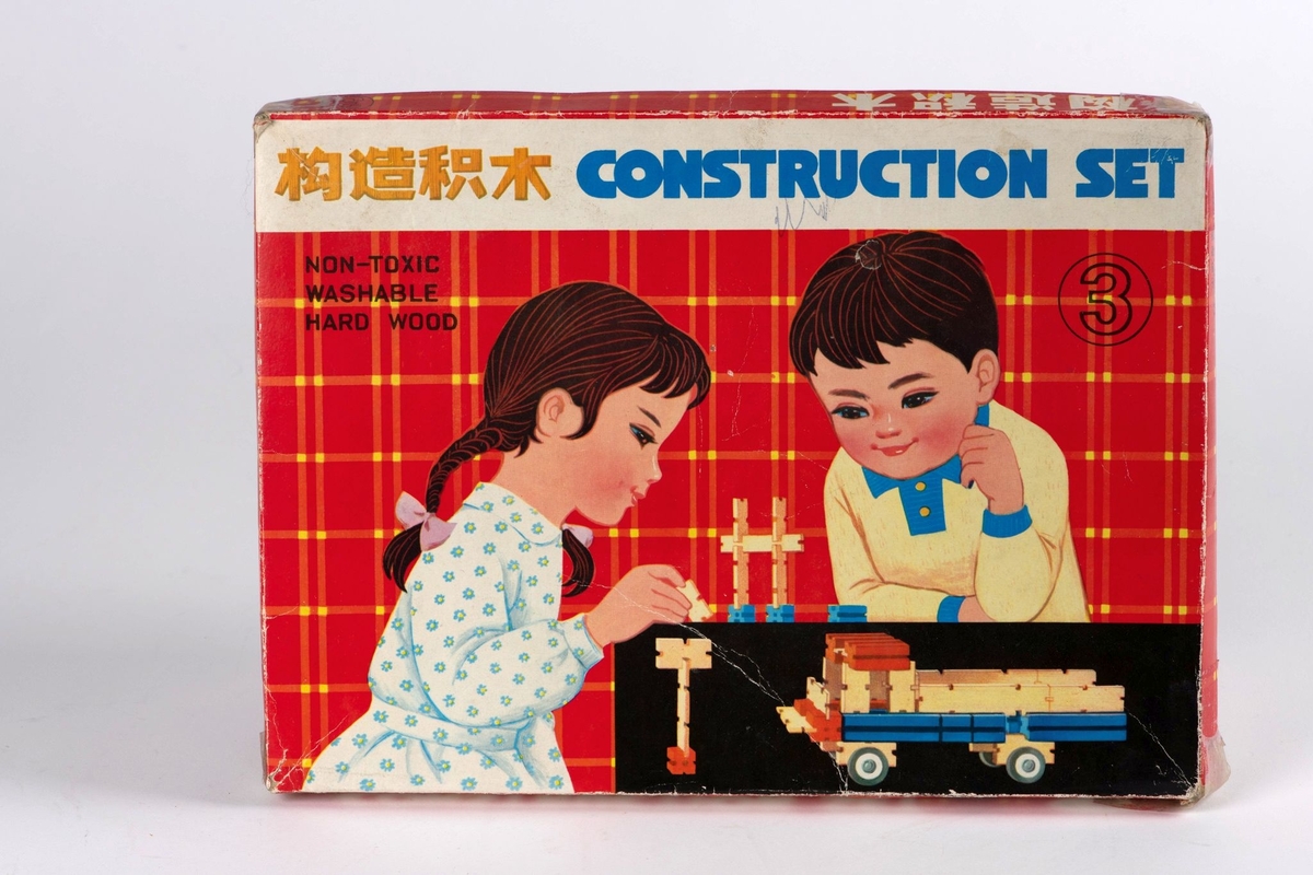På lokket: Tegning av gutt og jente som bygger med konstrusjonssettet.