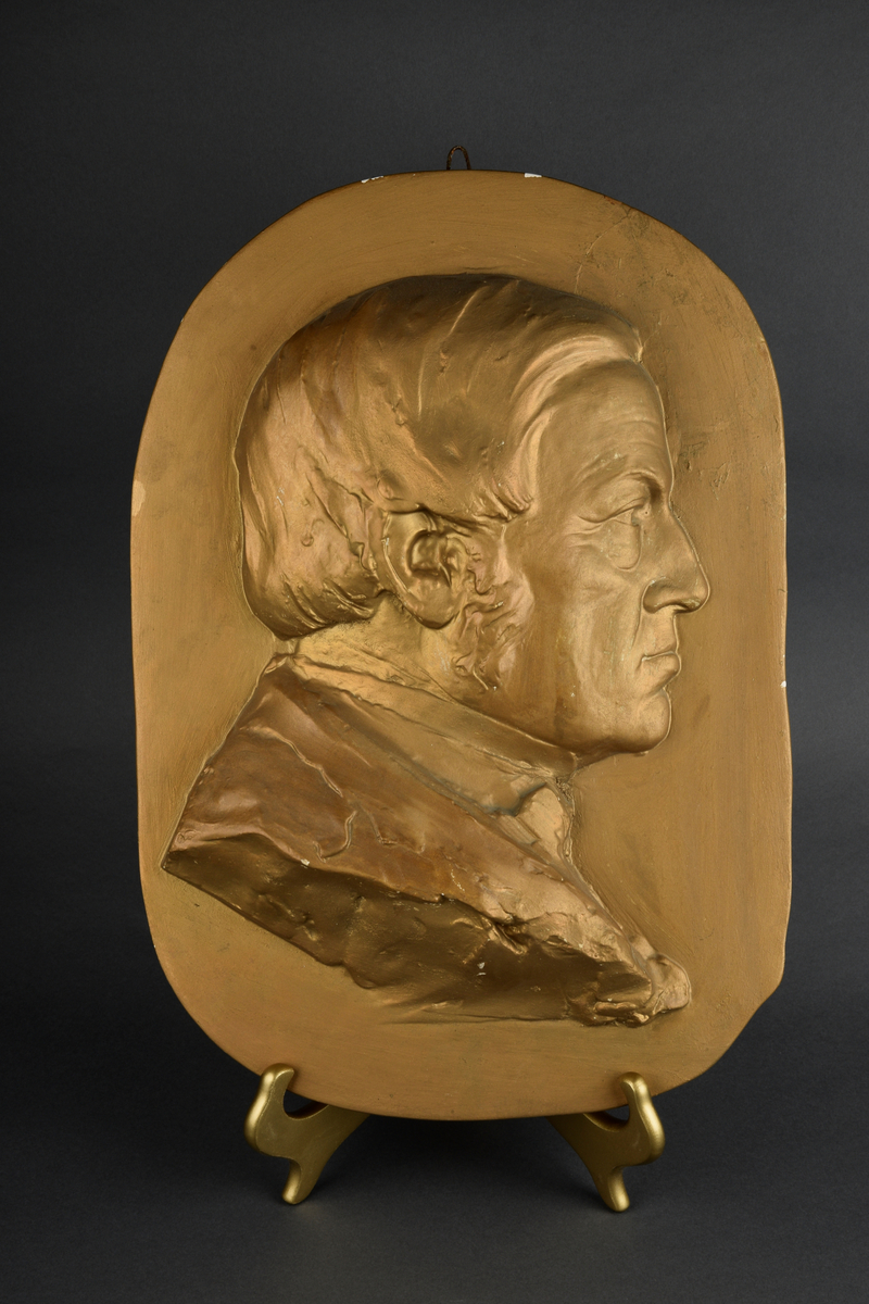 Relieff av Johan Feyer i profil.
