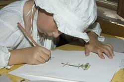 Levendegjøring på museum.Ferieskolen uke 31. De blomstene e