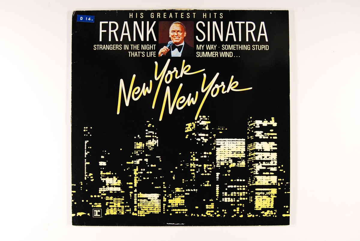"Skyline" med skyskrapere. Bilde av Frank Sinatra på både fremside og bakside.