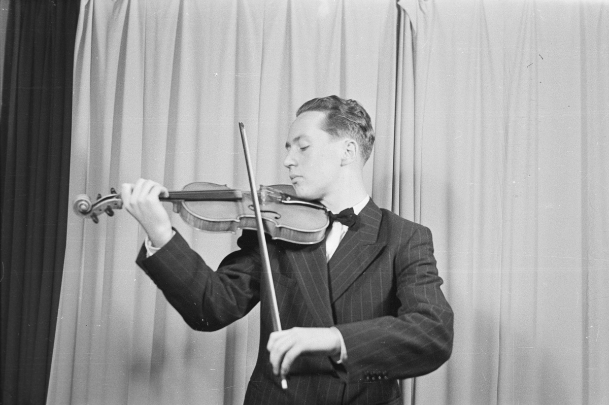 En musiker med fiolin,ukjent