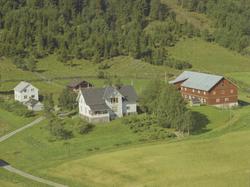 Riddervoldsrud, også kalt Kremmerlia (Kræmerlia). Gårdsbruk.