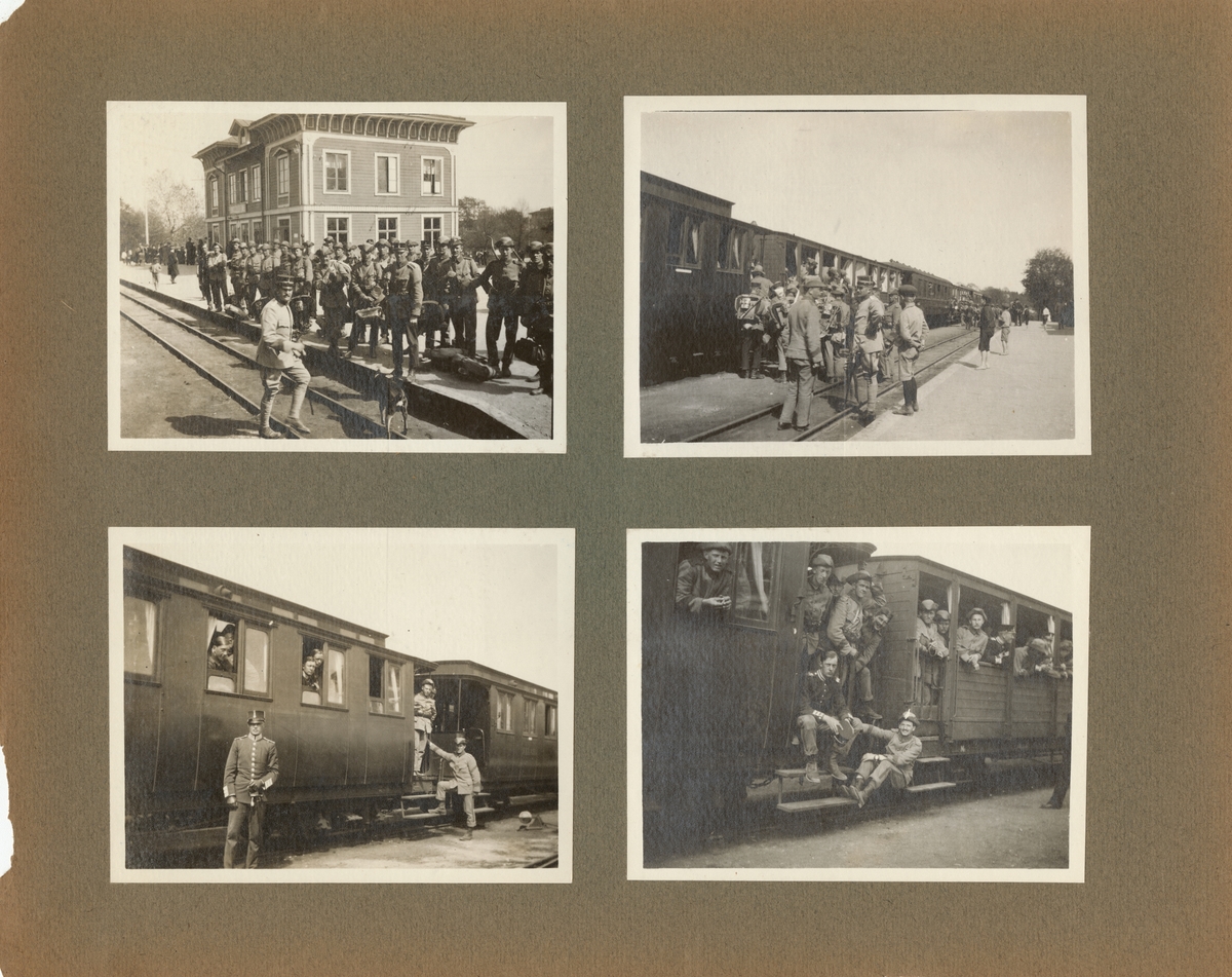 Truppförflyttning med tåg. Soldater stiger på tåget. På perrongen står barn och tittar på.