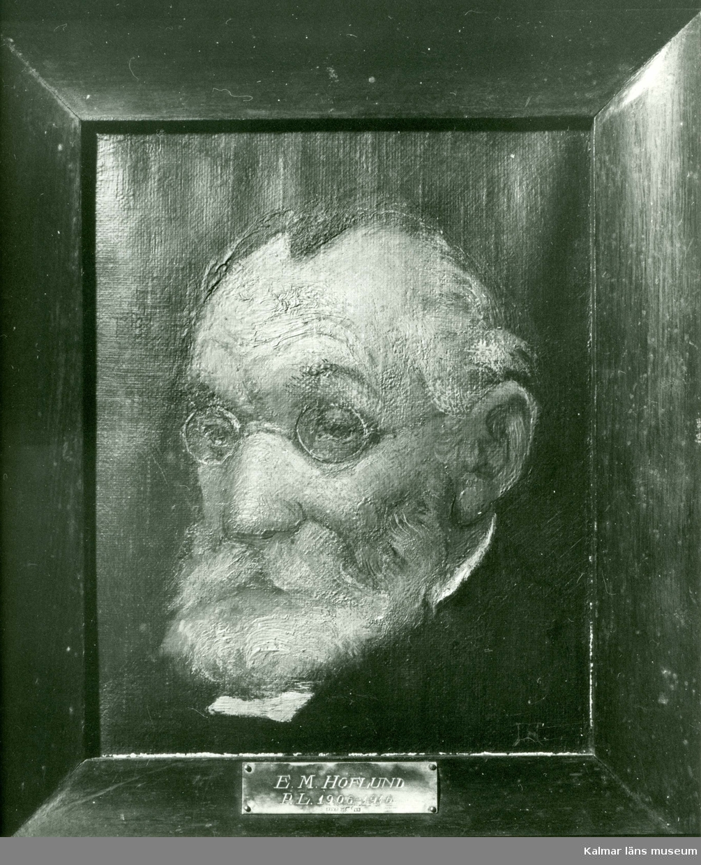 Porträtt av prästen E M Hoflund, målat av hans son, Ivan Hoflund.
Målningen är utförd under 1900-talets första hälft.