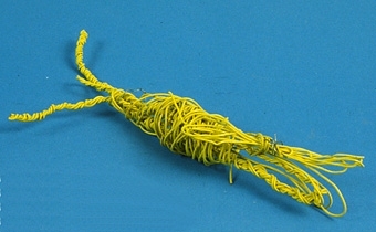Tunn ihoplindad ståltråd med gult plastöverdrag. 



Neg.Nr. 1987-06
