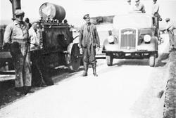 Lastebil, personer, klær.