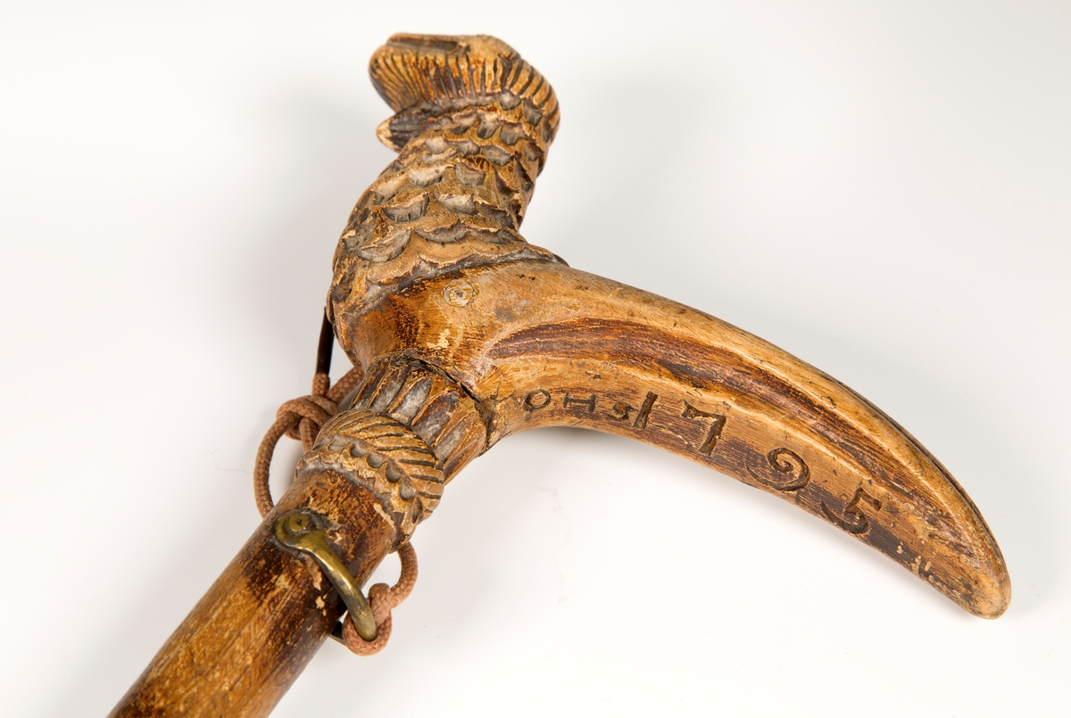 Håndtak skåret som fugl