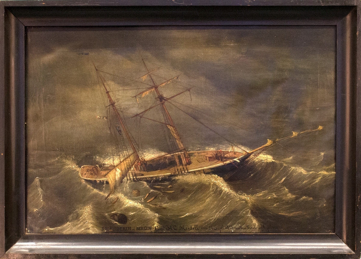 Skipsportrett av skonnert SØERIDDEREN i storm med ødelagte seil på opprørt hav. Ser tønner og vrakgods i sjøen samt mannskap på dekk og i riggen.