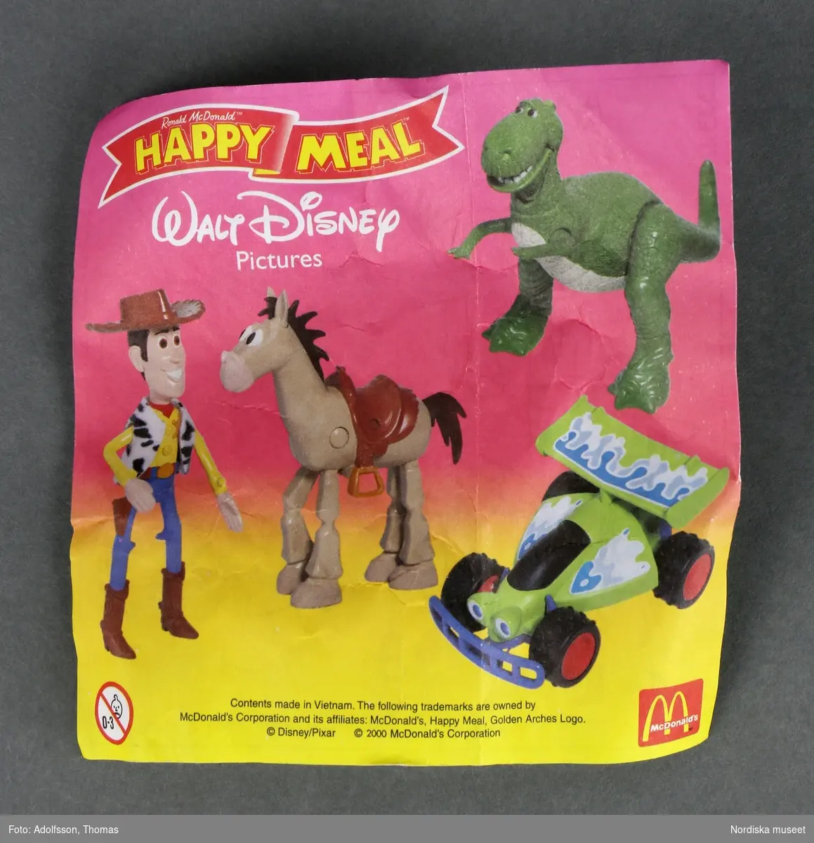 Figuren föreställer en dinosaourie vid namn Rex, som förekommer i filmen Toy Story.