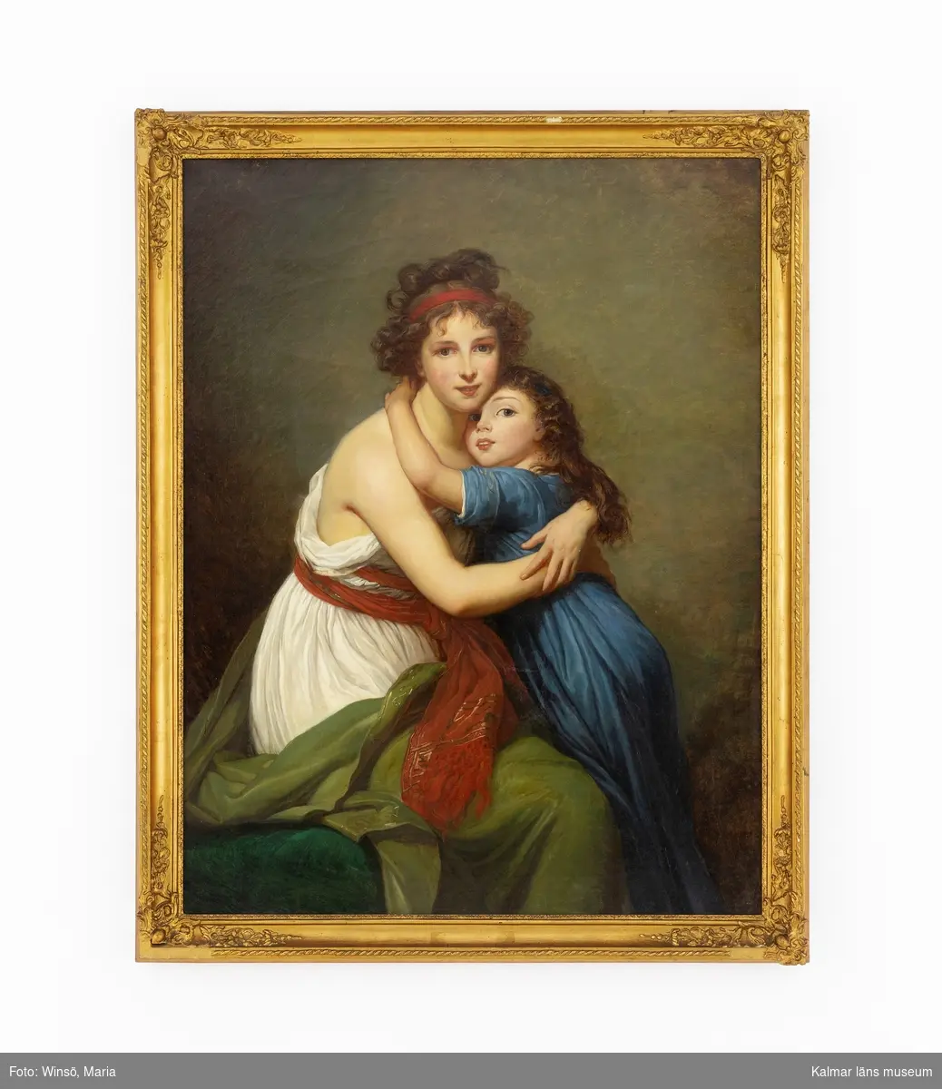 Kopia efter Marie Elisabeth Louise Vigée-Lebruns Självporträtt med dotter. Motivet föreställer en kvinna och en flicka som håller om varandra, mot en mörk bakgrund. Framträdande färger är blått, grönt, vitt och rött.