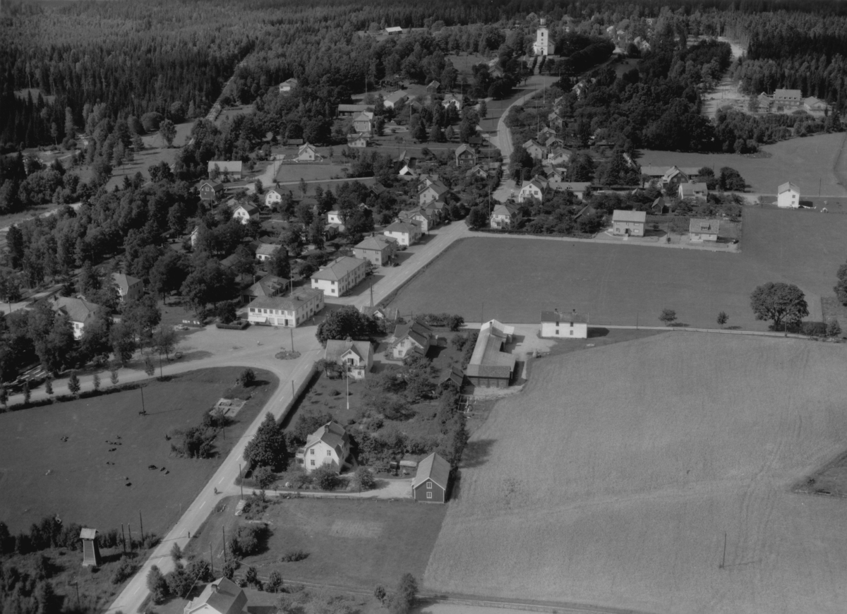 Flygfoto över Korsberga i Vetlanda kommun, Jönköpings län.  Nr: 1211/1957