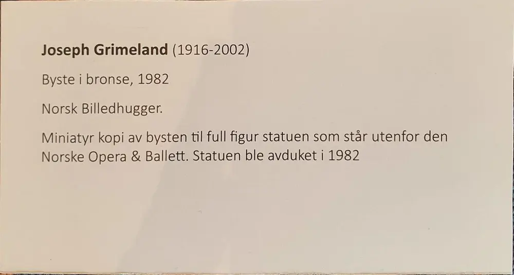 Plakett til byste. Kort informasjon om Joseph Grimeland