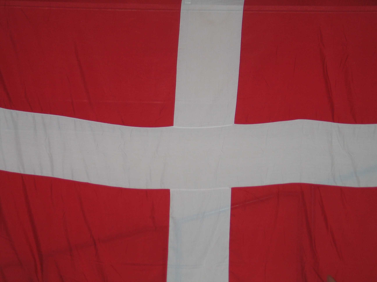Det danske flagget sydd i polyester.