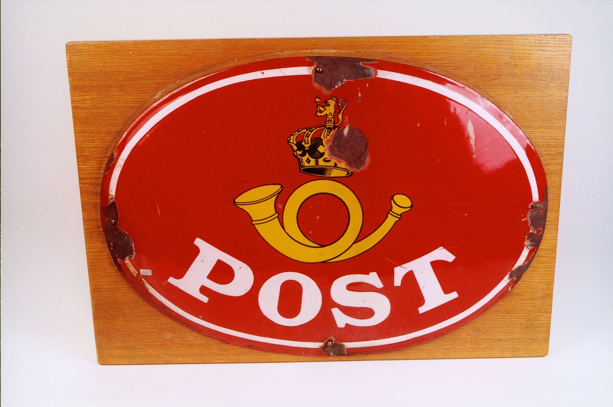 postmuseet, gjenstander, skilt, postskilt, ovalt opplysningsskilt med posthorn og krone 