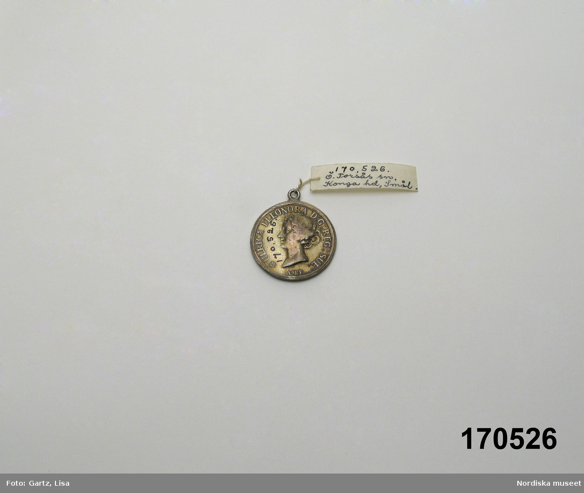 Huvudliggaren:
"Medalj använd som hängsmycke eller del därav, Ulrica Eleonora 1680."