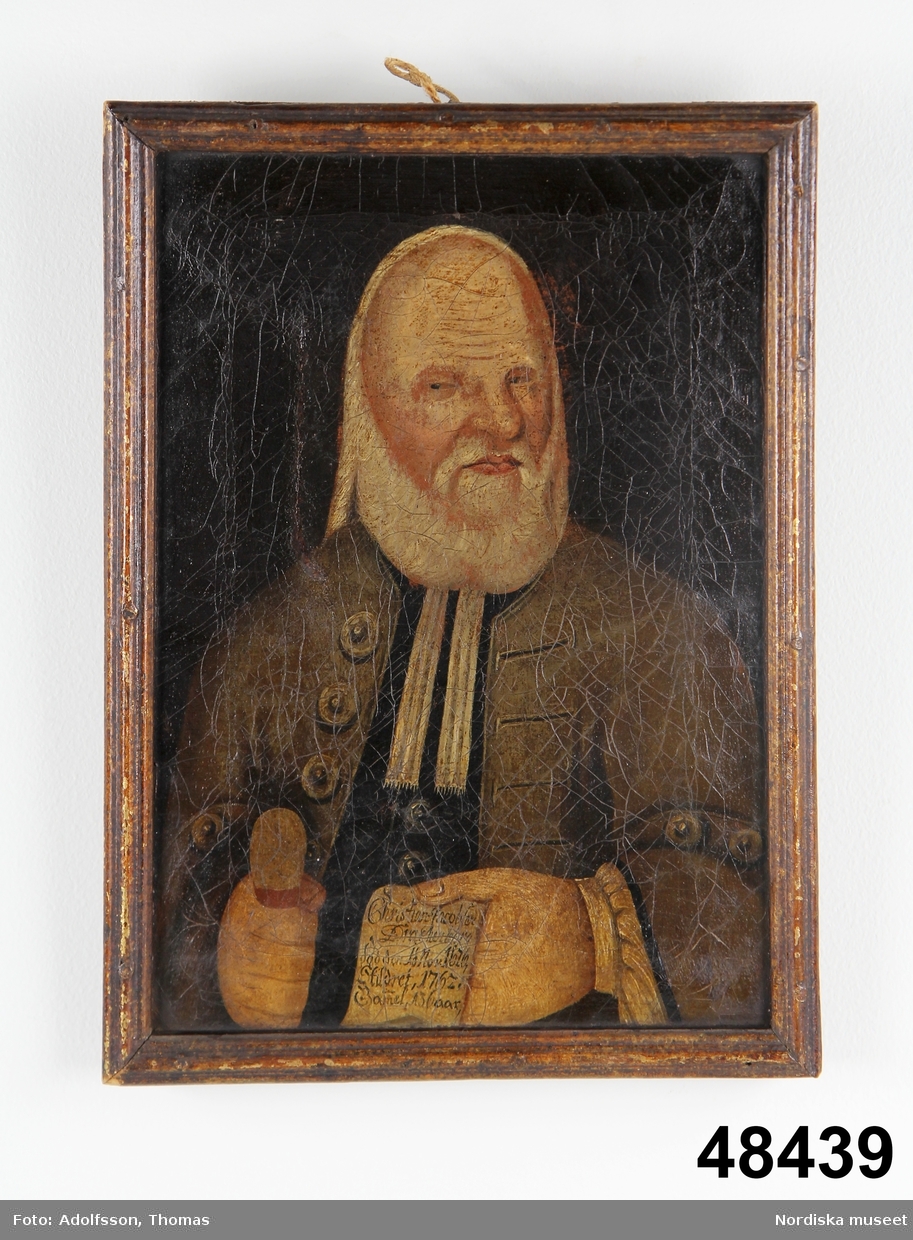 Porträtt av äldre herre, prästporträtt, midjebild.