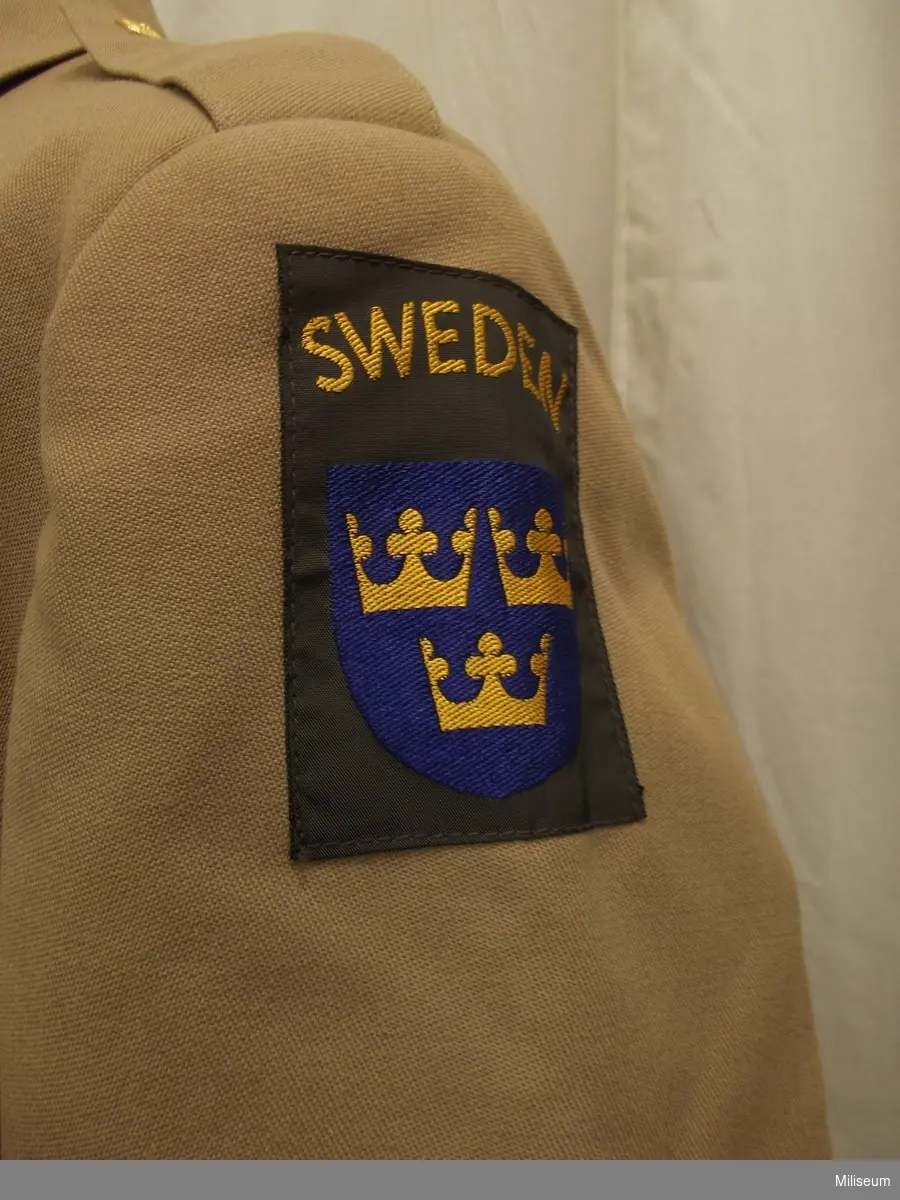 Vapenrock m/1961 för svensk FN-personal.
