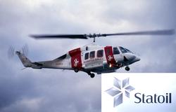 Helikopter i luften ved Statfjord C.
Dette er N31853 Bell 2