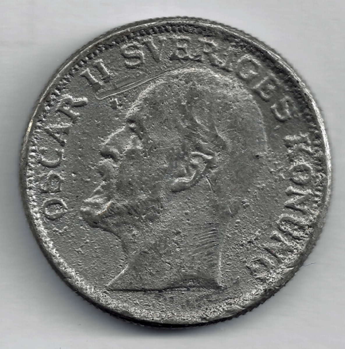 Falsk svensk 2-krone med preg 1907. Nærmere opplysninger savnes.