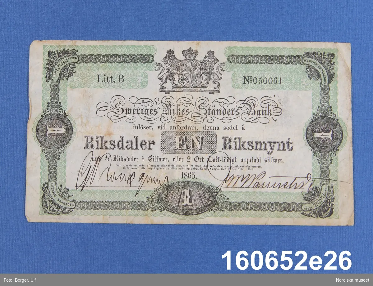 Sveriges Rikes Ständers Bank, 1 riksdaler riksmynt. Daterad 1865, litt B nr 050061.