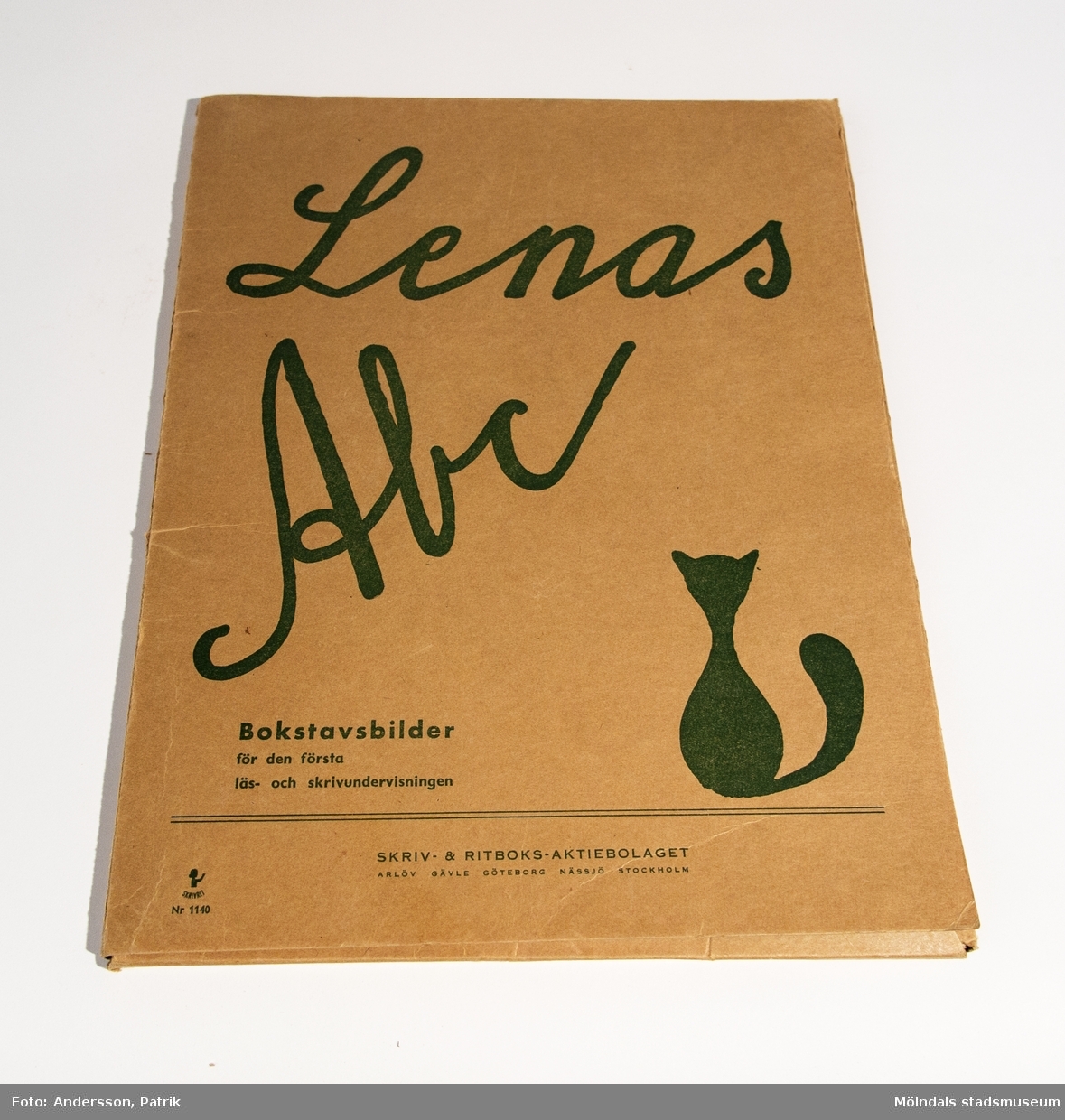 "Lenas ABC", mapp med bilder, bokstaven "H" saknas.