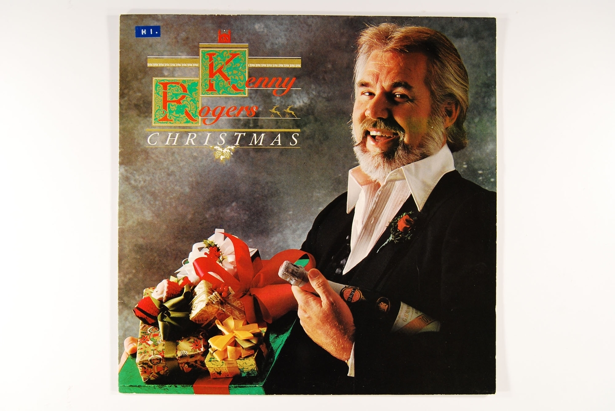 På fremsiden er det bilde av Kenny Rogers kledd i dress. Han har ei champagneflaske under en arm og holder frem gaver med den andre hånden. 

På baksiden er det bilde av Kenny Rogers, hans kone og en hund. De sitter i et julepyntet rom.