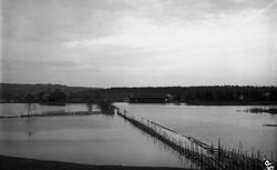 Flom i Lenaelva 1927. Fire bilder: De to første med utsikt m