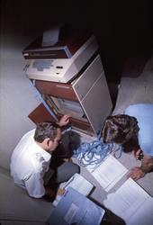Mannskap ved telexmaskinen på M/S ‘Vikara’ (b.1973, Mitsubis
