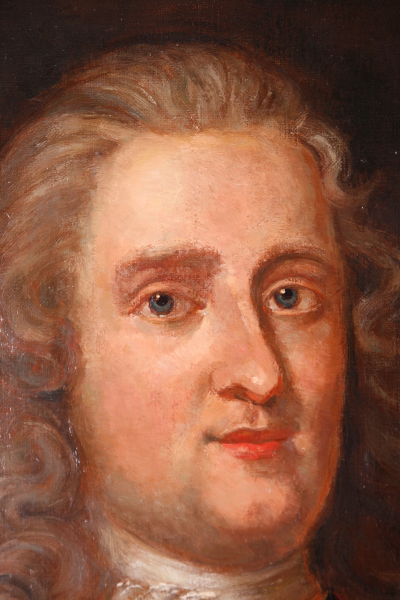 Portrett av Peter Wessel Tordenskiold. Avbildet i mørk rustning med rødlig kappe over høyre skulder. Medalje på brystet.