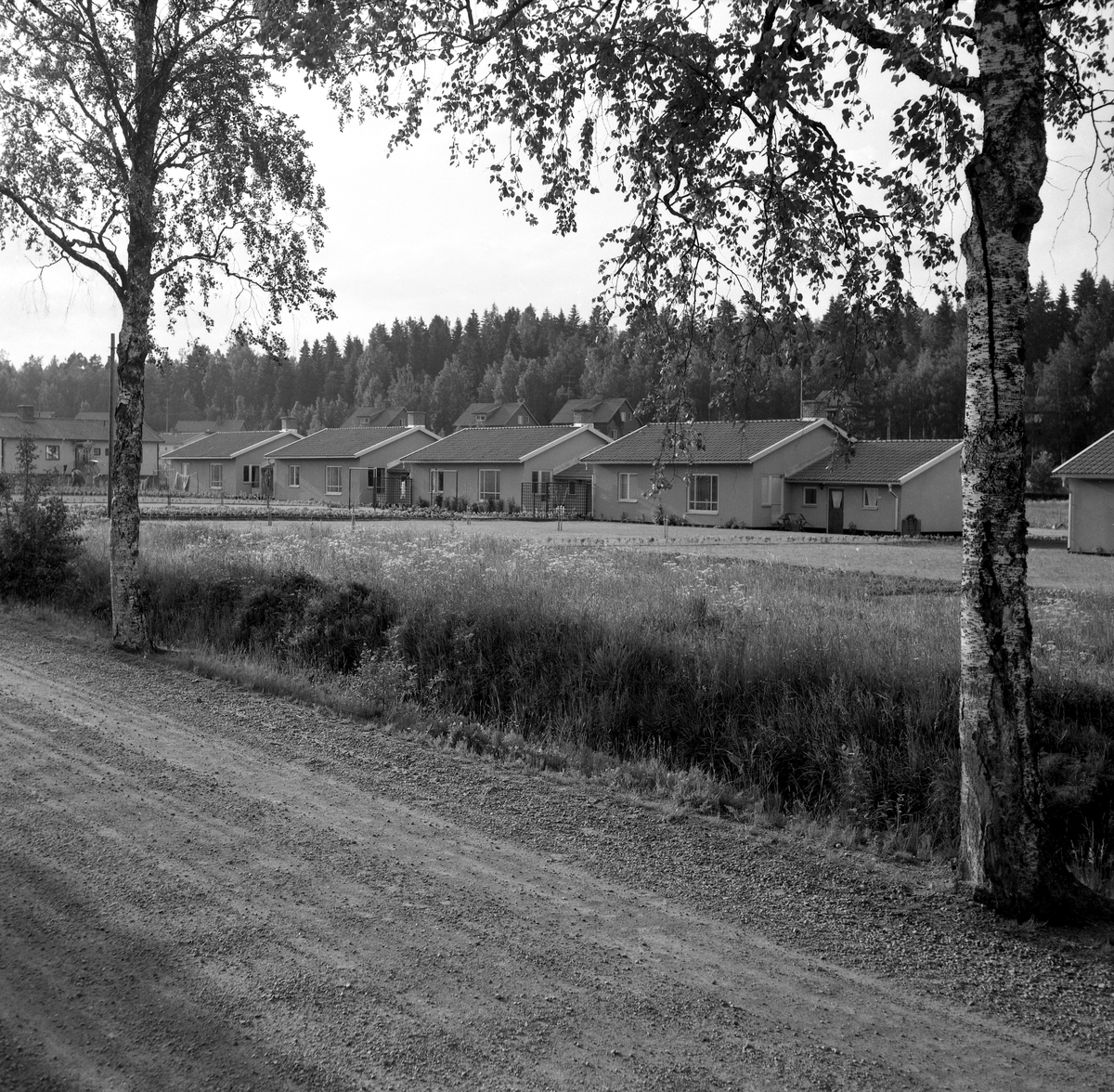 Någonstans i Värmland - från slutet av 1950-talet: Älvenäs. Lämna gärna en kommentar om du vet något om bilden.