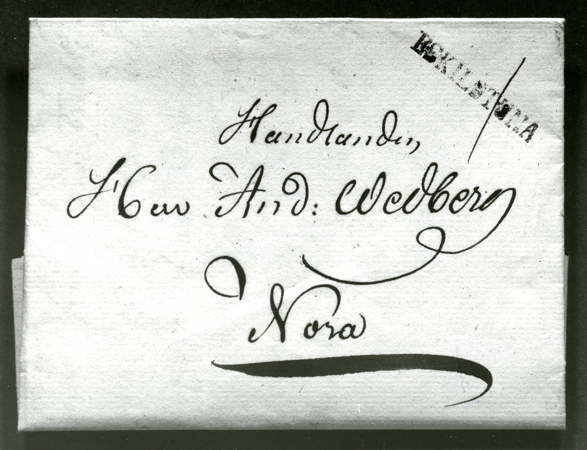 Förfilatelistiskt brev avsänt från Eskilstuna till Handlanden Herr And. Hedberg, Nora. Brevet har karteringsnummer 1 och en rakstämpel "Eskilstuna".