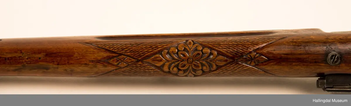 Utskjært motiv: Jeger med hund.