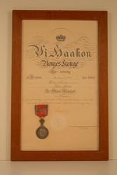 Diplom i glas og ramme, medalje